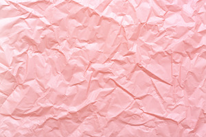 Crumpled paper texture pastel pink