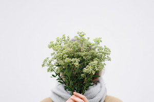 Woman holding a bouquet of white, a Person Photo by MistyDay