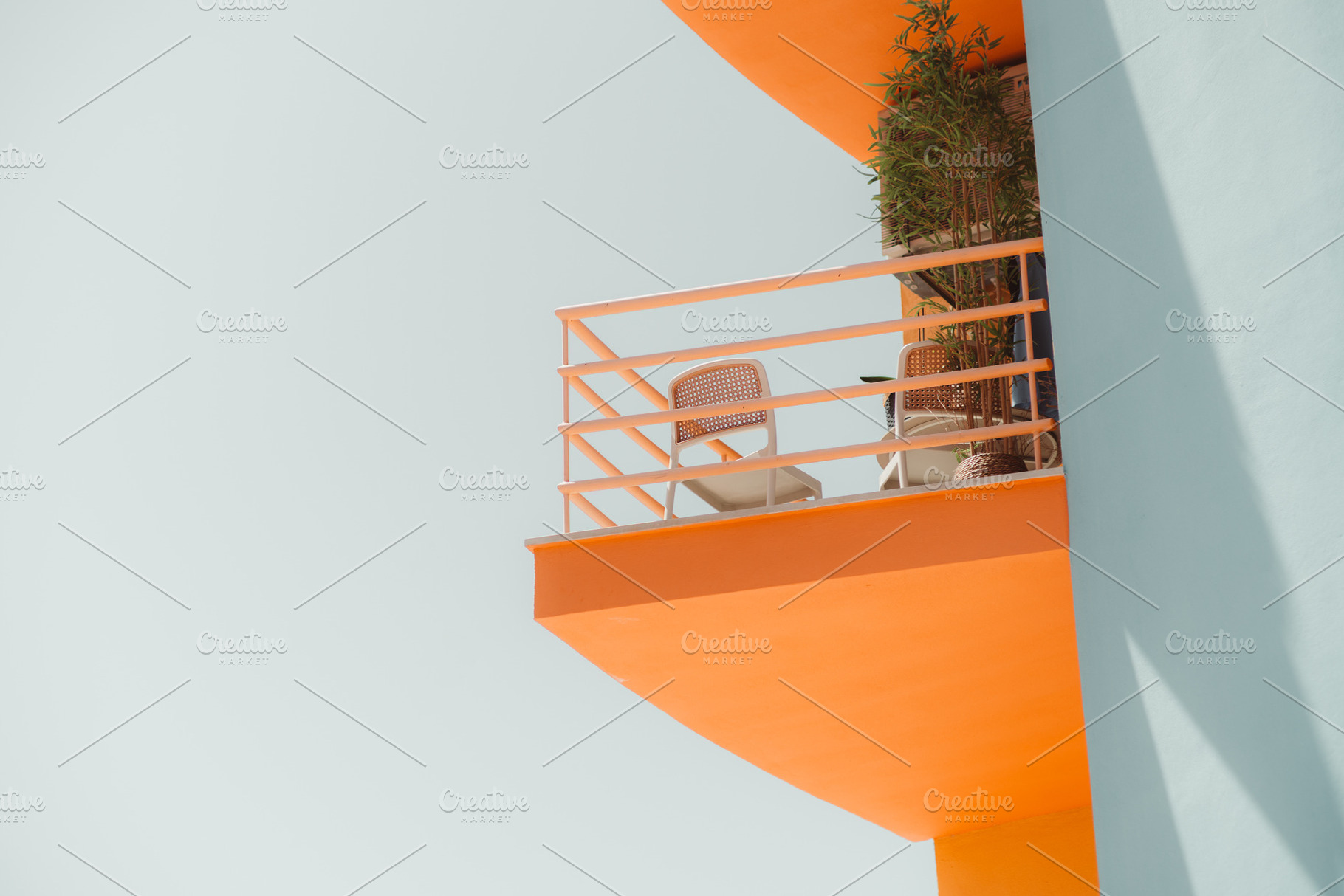 Orange Balcony on Pastel Facade, an Architecture Photo by SkyNext