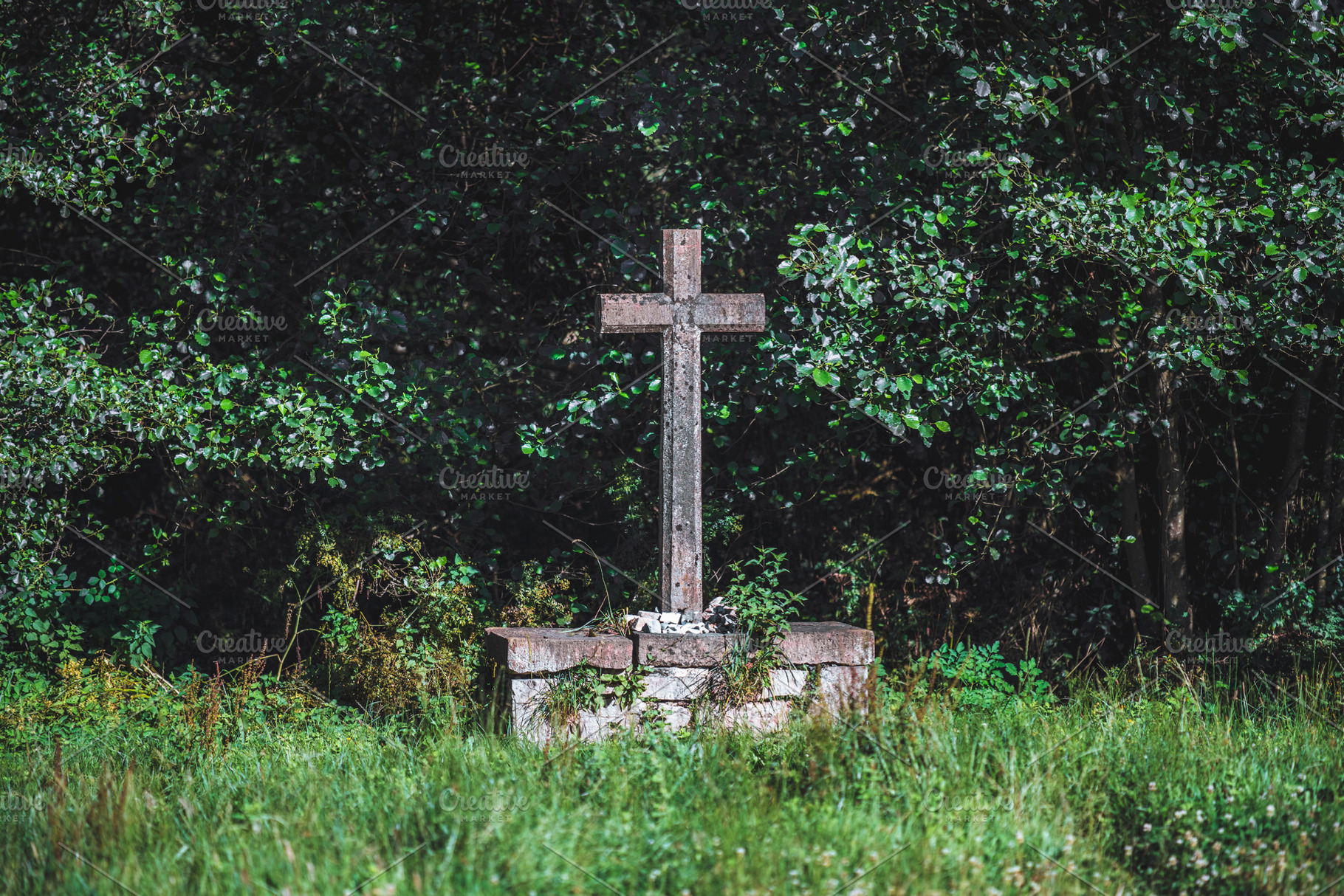 Old stone cross in nature, an Architecture Photo by SkyNext