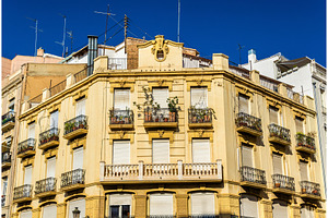 Beautiful buildings in the old town of valencia spain containing, an Architecture Photo by Leonid Andronov
