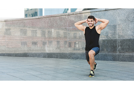 Young millennial sporsman doing, a Sports & Recreation Photo by Prostock-Studio