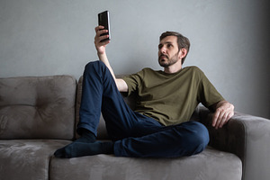Young man relaxing on a comfortable