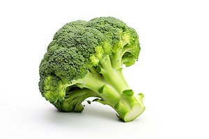 Green ripe broccoli isolated on white background, a Food & Drink Photo by AlyaAnd
