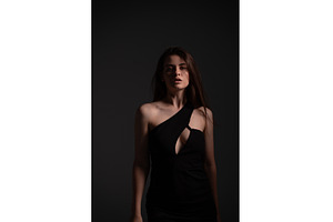 Young woman posing in a fashionable, a Person Photo by volodymyrshtun13795