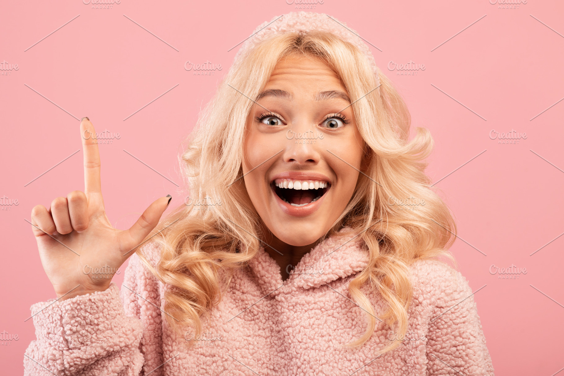 Great idea concept. Excited lady having wow creative idea, raising finger up or, a Photo by Prostock-Studio
