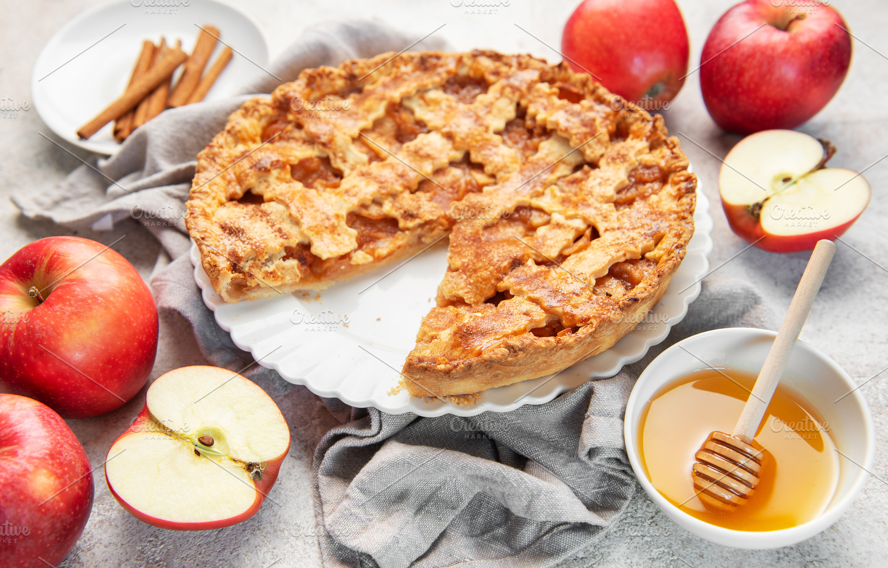 Fresh baked apple pie with cinnamon and honey, a Food & Drink Photo by Olena Rudo