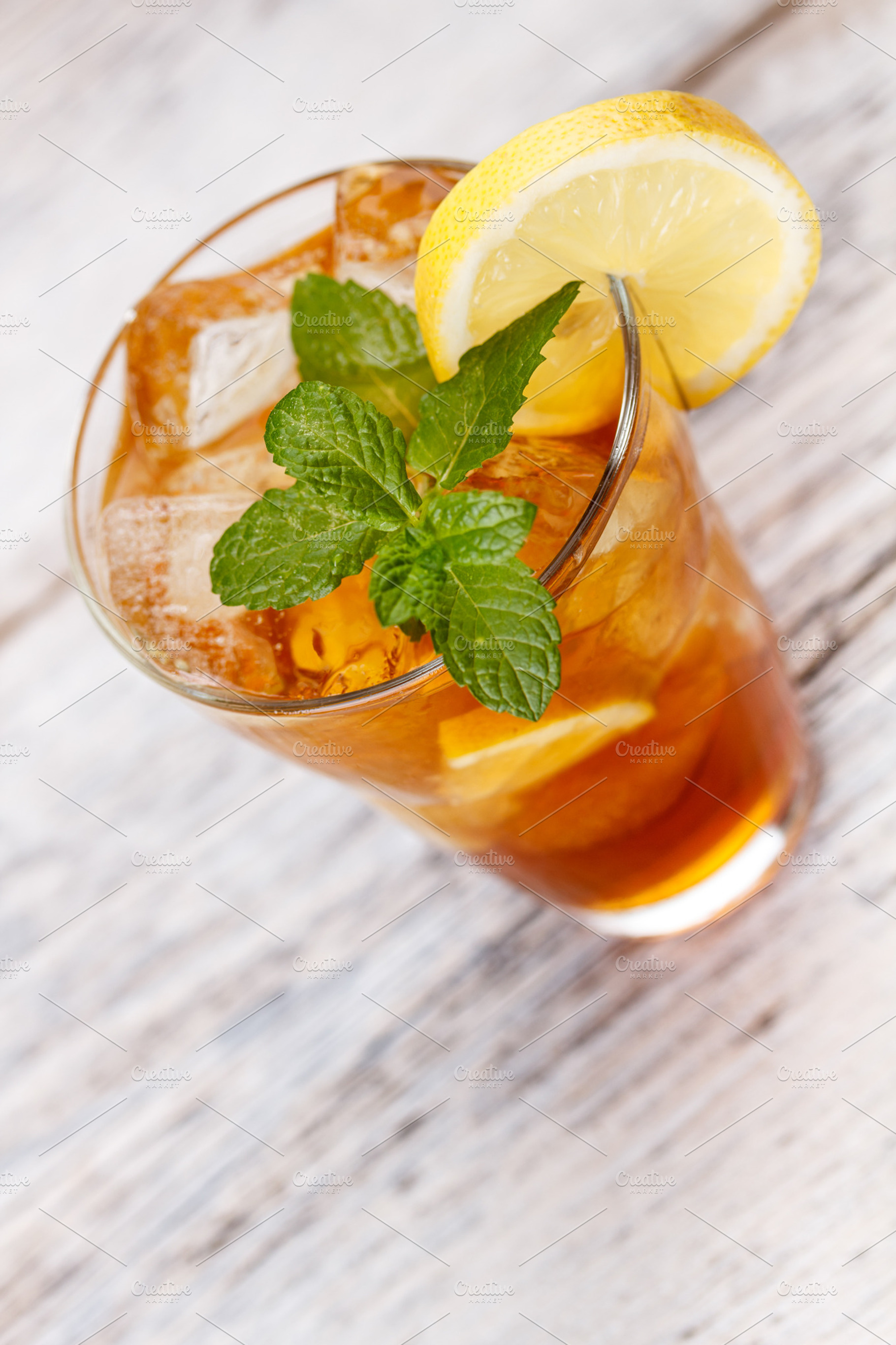 Glass Of Ice Tea Containing Tea Ice And Lemon