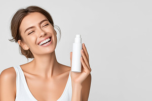 Happy woman smiling and holding, a Beauty & Fashion Photo by MistyDay