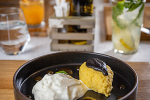 Creamy polenta with burrata cheese, a Photo by Grafvision photography