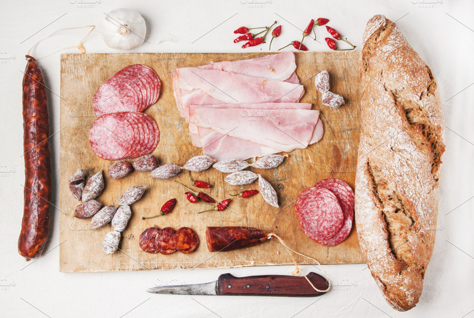 Sausage and bread stock photo containing salami and ham