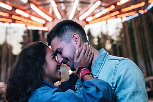 Young smiling couple in park, a Person Photo by Artem Varnitsin