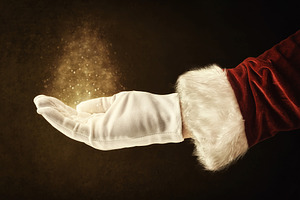 Believing in magical Christmas with Santa's hand and sparkling a, a Holiday Photo by Davizro's Market