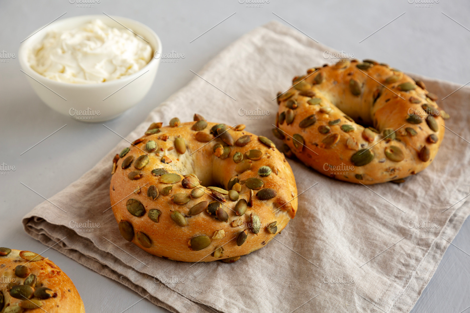 Homemade Pumpkin Seed Bagels for Breakfast Ready to Eat, a Food & Drink Photo by LiudmylaChuhunova