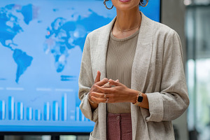 Businesswoman giving presentation gl, a Photo by Pixeness Studio