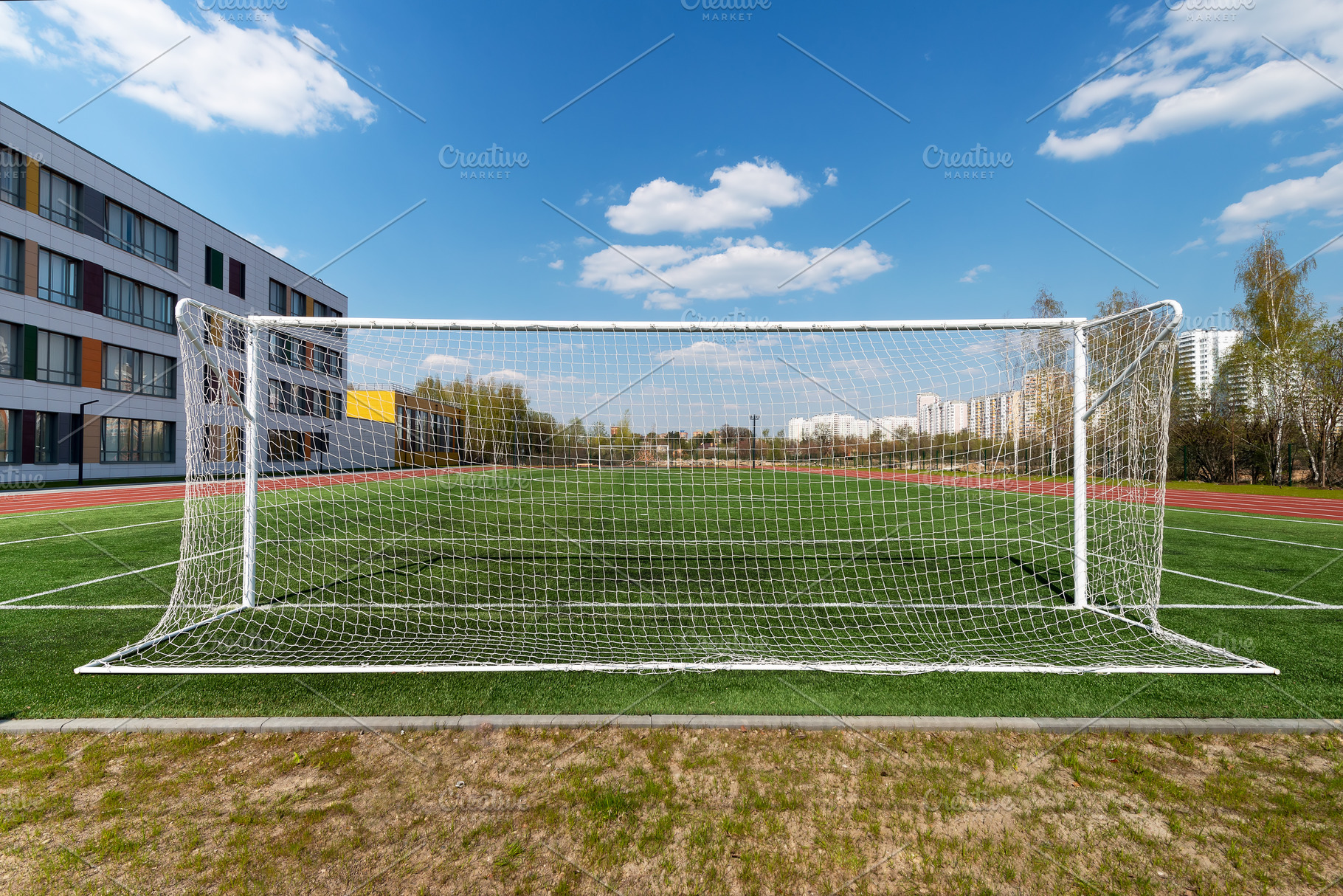 Football goal on a school field, a Sports & Recreation Photo by FedotovAnatoly