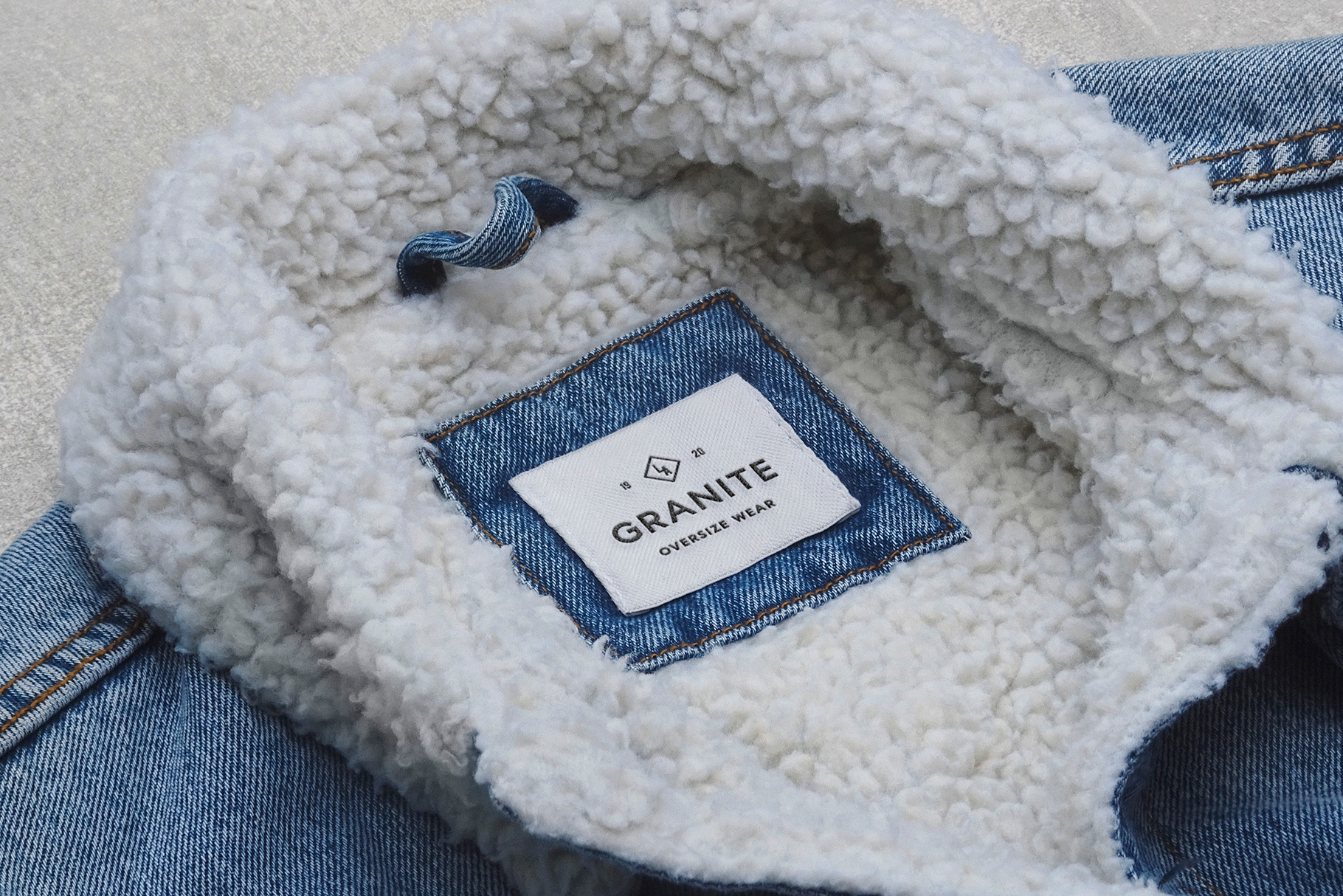 Logo Mockup Label Tag Denim Jacket, a Hoody Mockup by Asylab