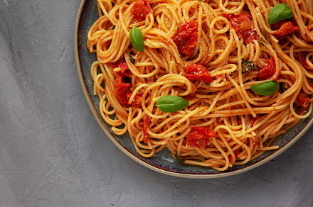 Homemade Spaghetti Pasta with Fresh Tomato Sauce on a Plate on a, a Food & Drink Photo by LiudmylaChuhunova