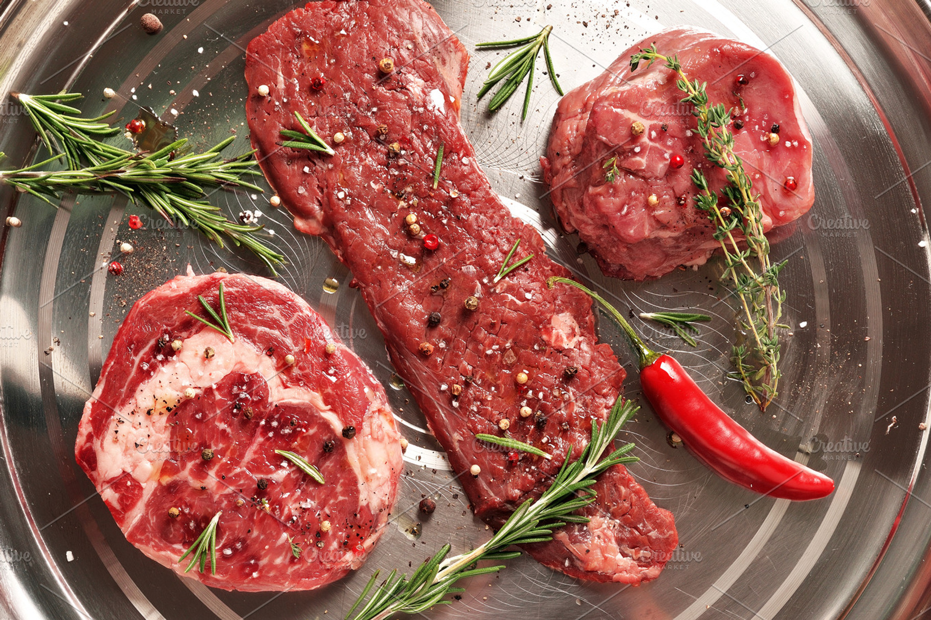 Fresh raw beef steaks containing beef, prime, and black angus, a Food & Drink Photo by Food Stock