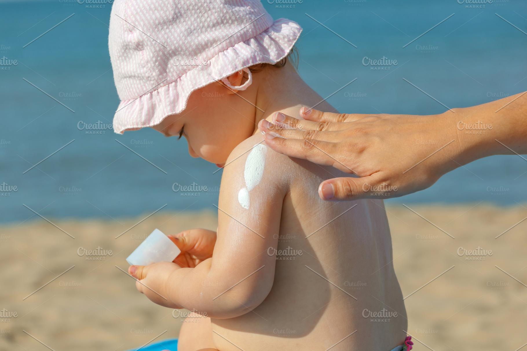 Baby sunscreen cream., a Person Photo by Antonio Gravante Market