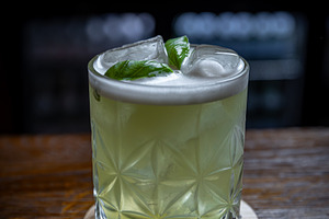 Refreshing green basil cocktail, a Photo by Grafvision photography