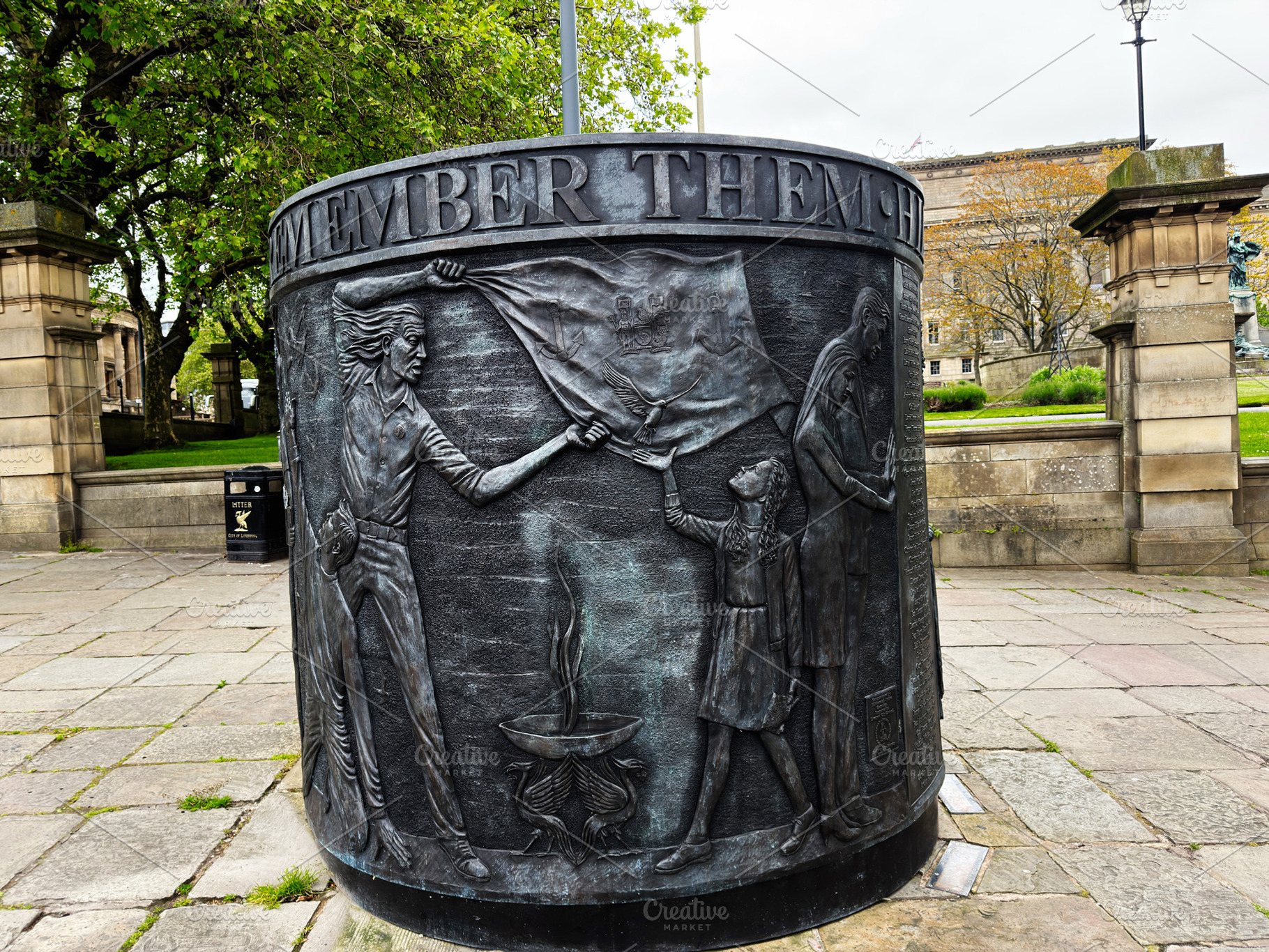 Bronze Hillsborough remembrance sculpture panel showing figures, a Photo by AS photostudio