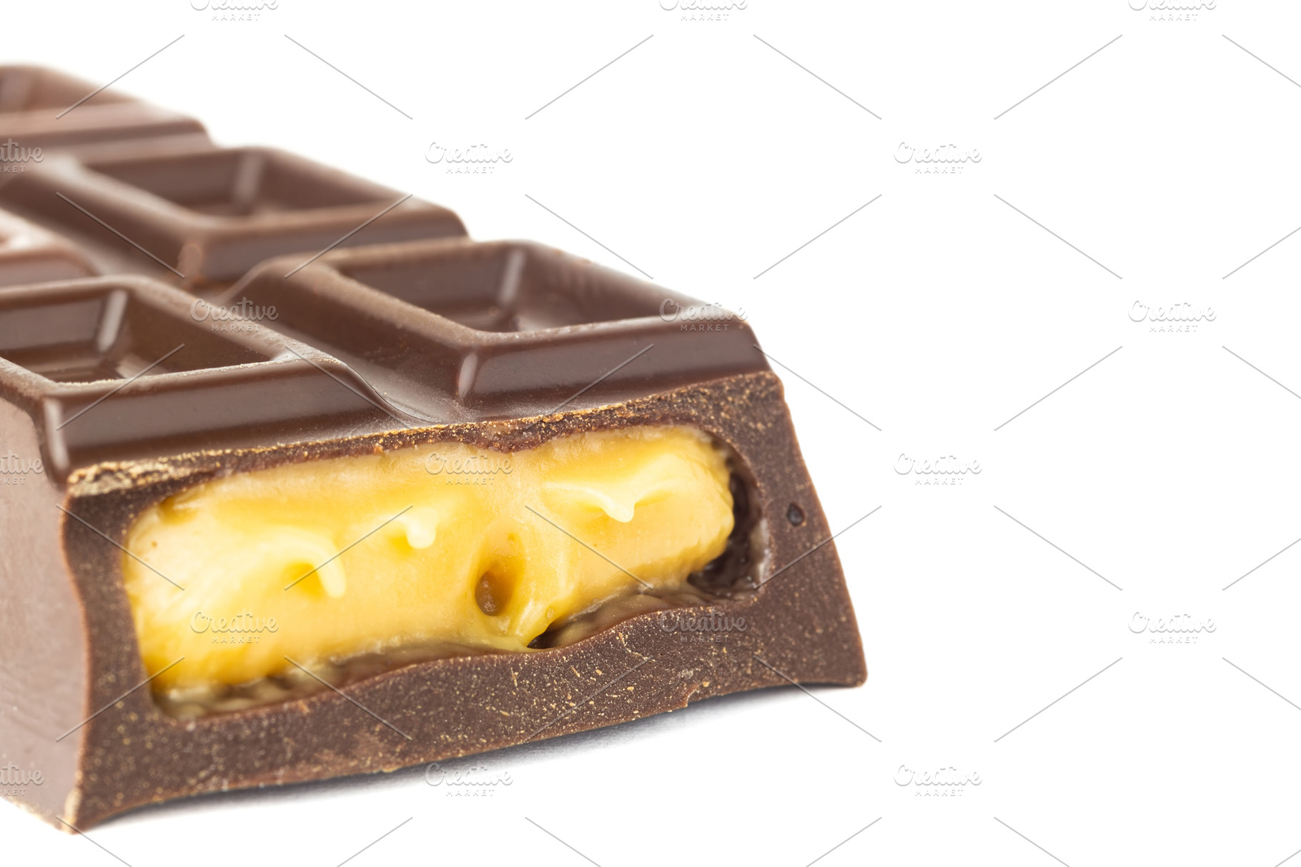 Chocolate bar isolated on white back, a Food & Drink Photo by AlexBush