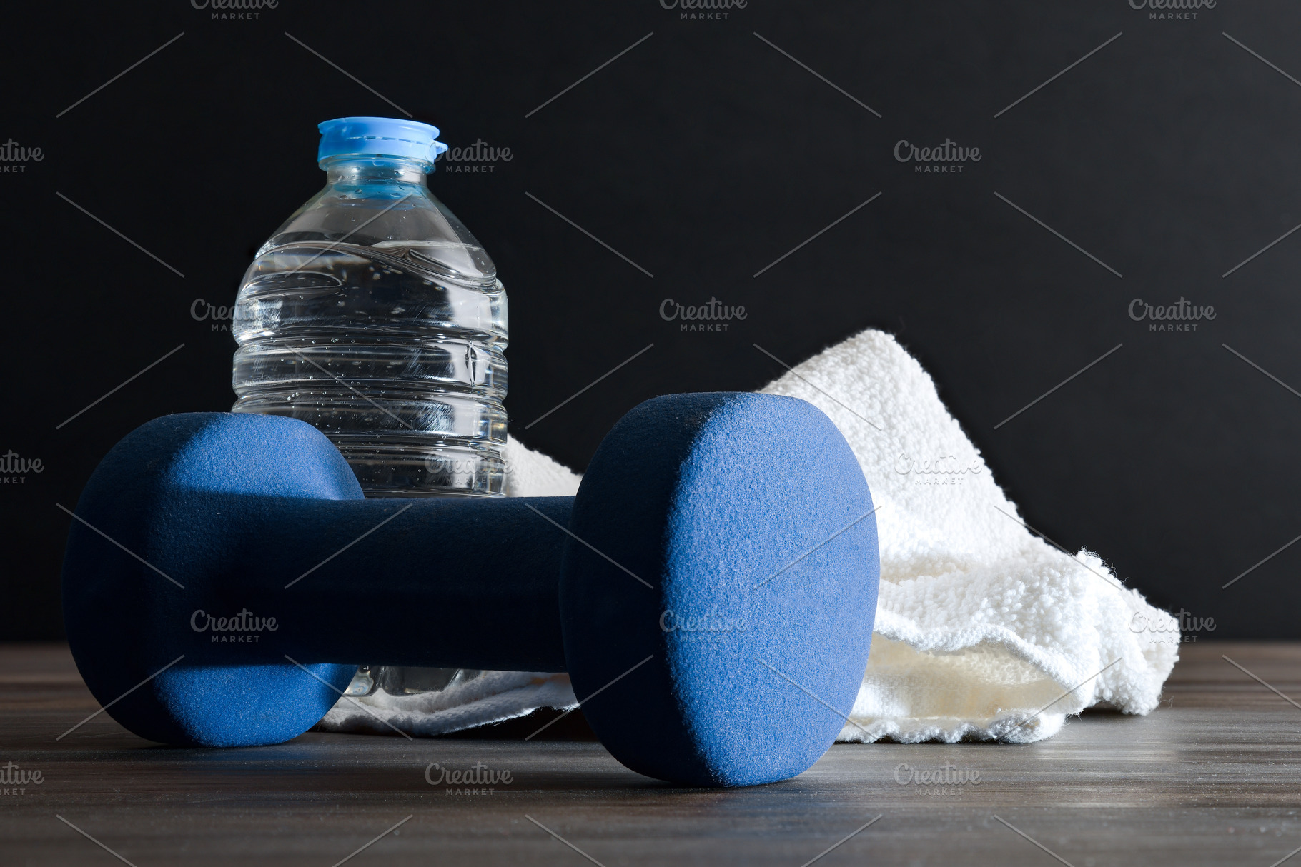 Sport training with dumbbells water and towel black isolated bac, a Sports & Recreation Photo by Davizro's Market