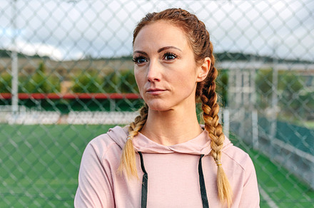 Serious sportswoman with boxer braids posing with crossed arms, a Sports & Recreation Photo by davidpereiras