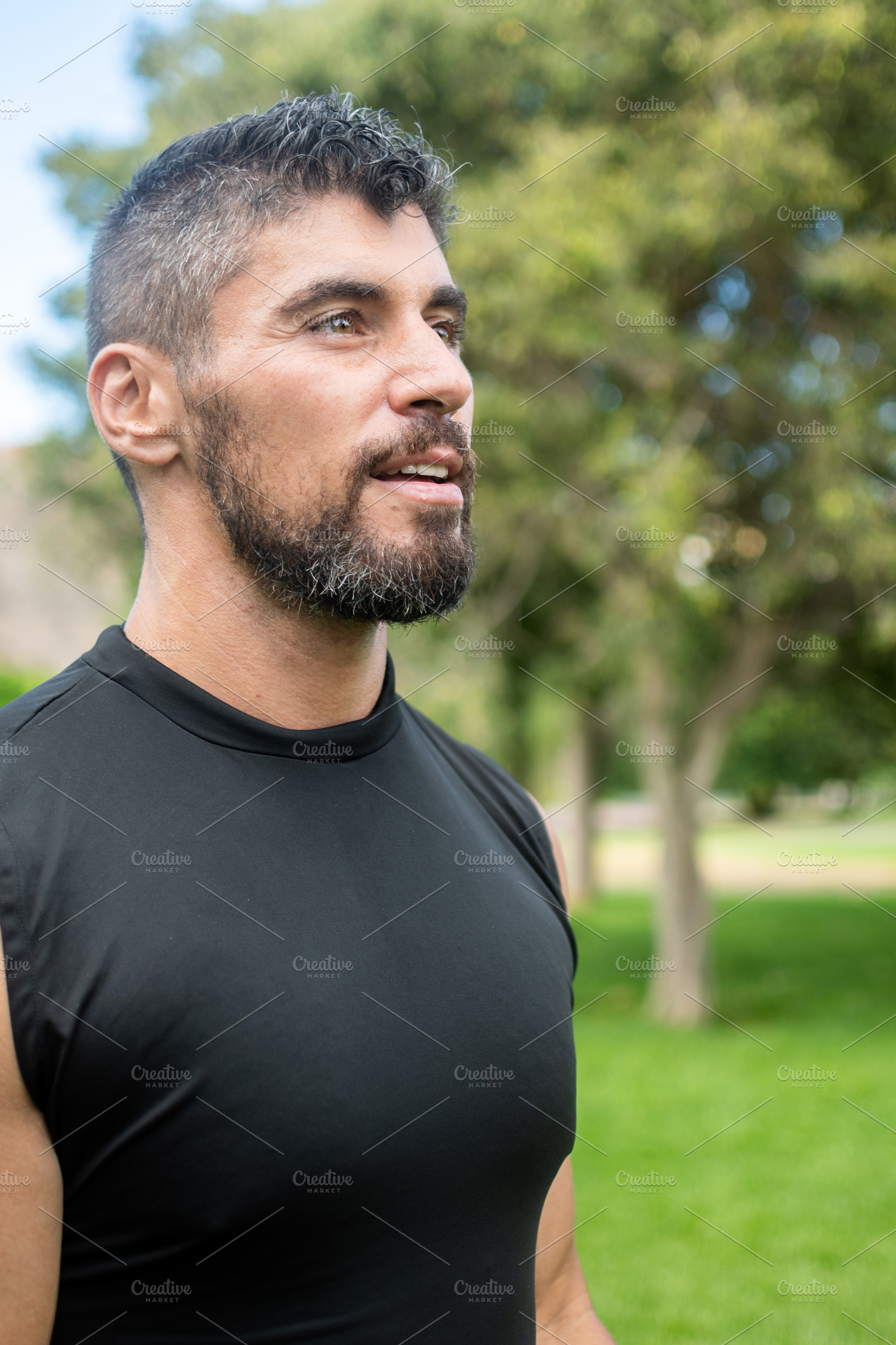 Athletic Man Taking a Break After an Outdoor Workout in a Green Park, a Sports & Recreation Photo by etorres69