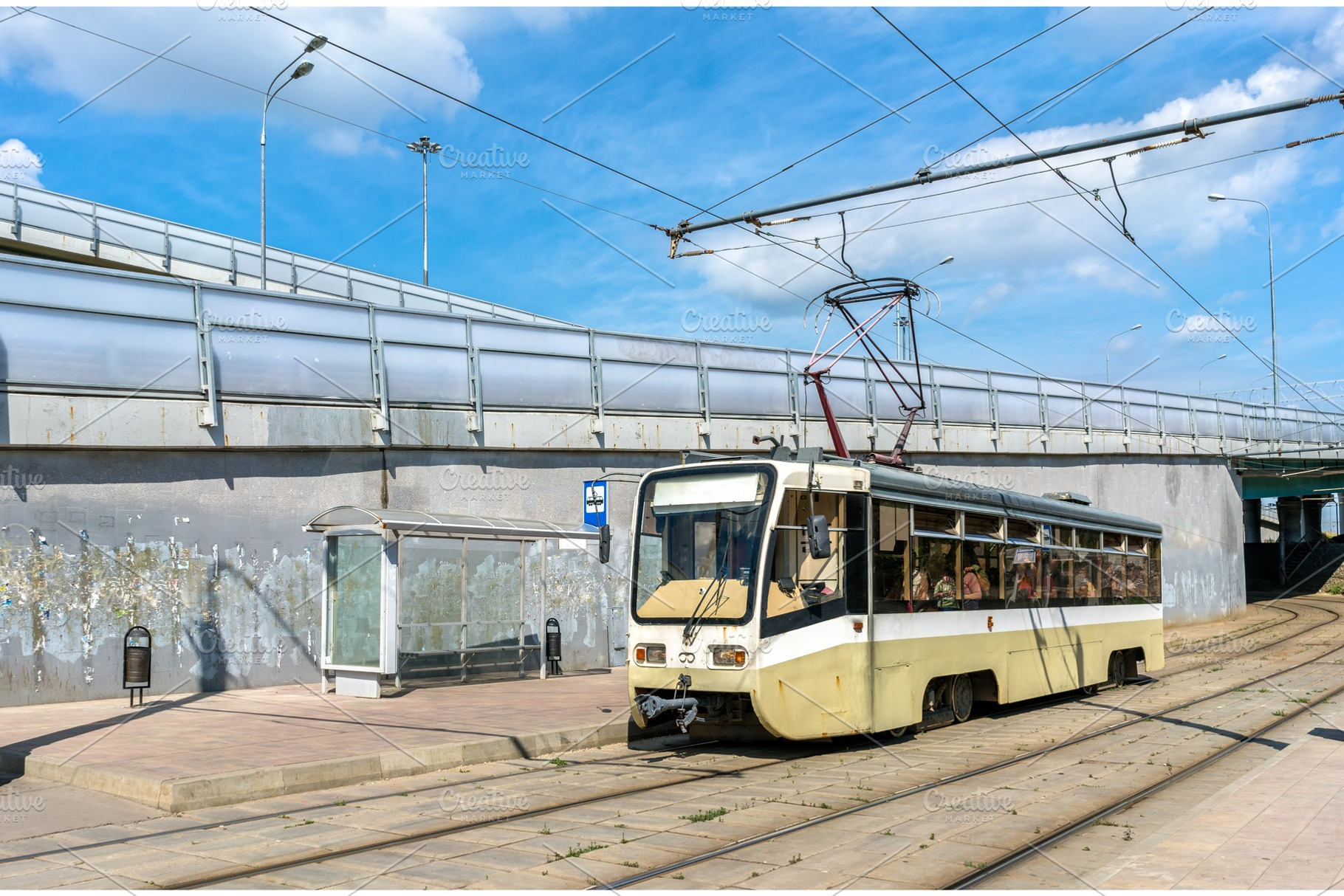 A city tram at Shosse Entuziastov Station in Moscow, Russia, a Transportation Photo by Leonid Andronov