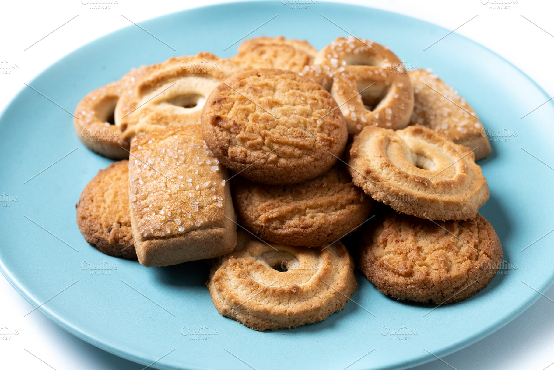 Assorted butter cookies on blue plate, a Food & Drink Photo by etorres69