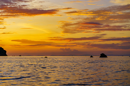 Sea among rocks on evening sunset. Island in tropical waters at, a Nature Photo by Casanowe-studio