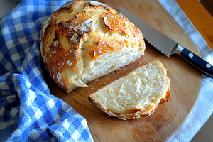 Sliced artisan sourdough bread, a Photo by Pavel_design