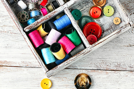 Buttons and spool of thread stock photo containing sewing and thread, an Industrial Photo by MLunov MLunov