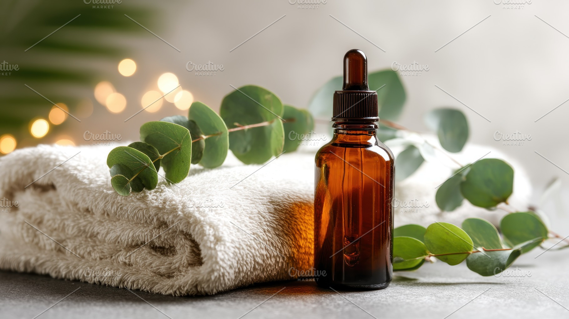 Amber dropper bottle of essential oil with eucalyptus leaves and, an Abstract Photo by José Manuel Gelpi