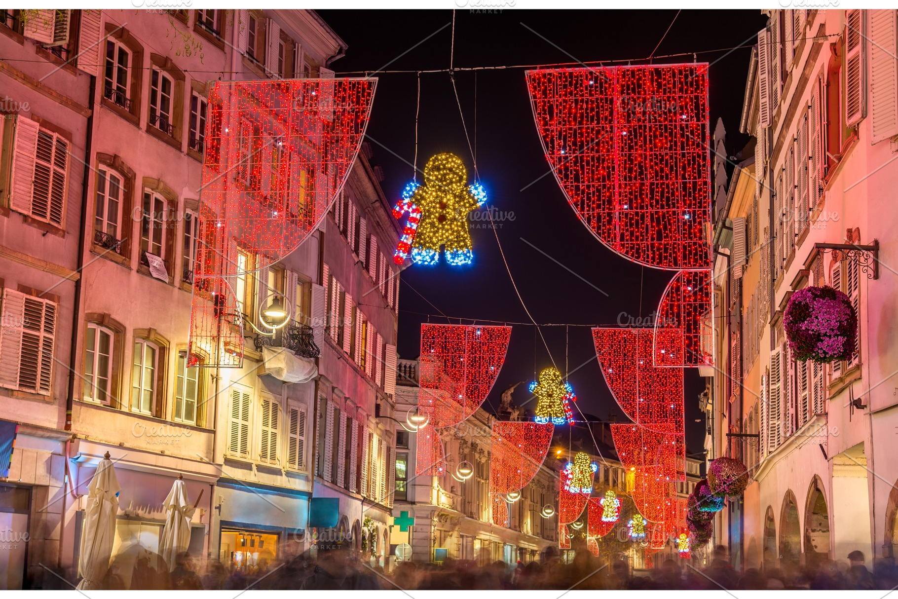 Christmas decorations on streets of Strasbourg, France, an Architecture Photo by Leonid Andronov