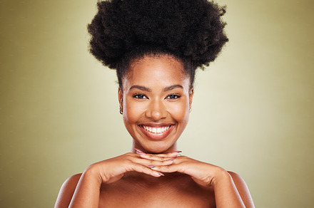 Black woman, hands and smile for skincare beauty, cosmetics or makeup against a studio background. Portrait of African American female model smiling in satisfaction for perfect facial skin treatment, a Photo by Peopleimages.com