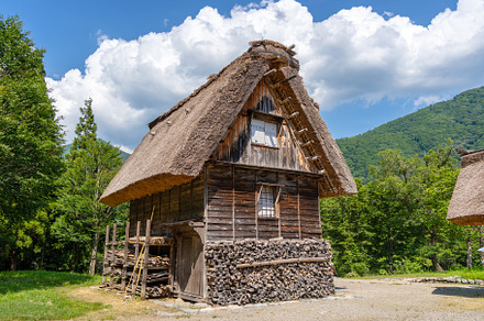 Traditional wooden house in the peaceful village of Shirakawa-go, an Architecture Photo by GoodGoods