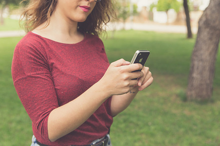 Woman with cellular phone