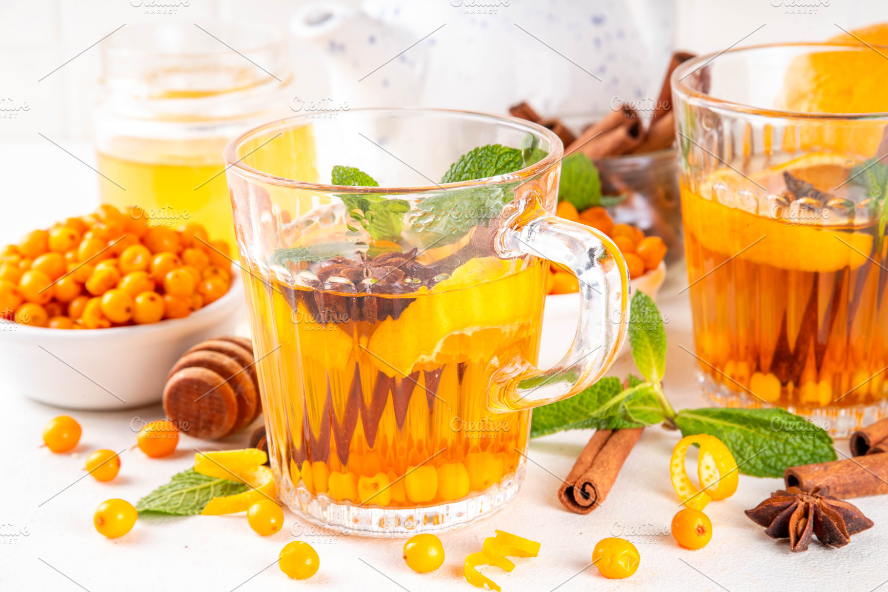 Sea buckthorn hot tea  drink with orange zest, cinnamon spices a, a Food & Drink Photo by Rimma