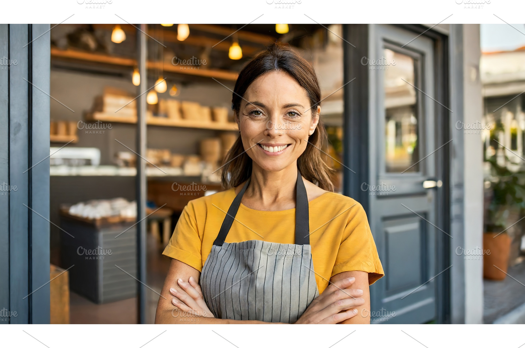 Smiling small business owner, a Person Photo by Igor Tichonow