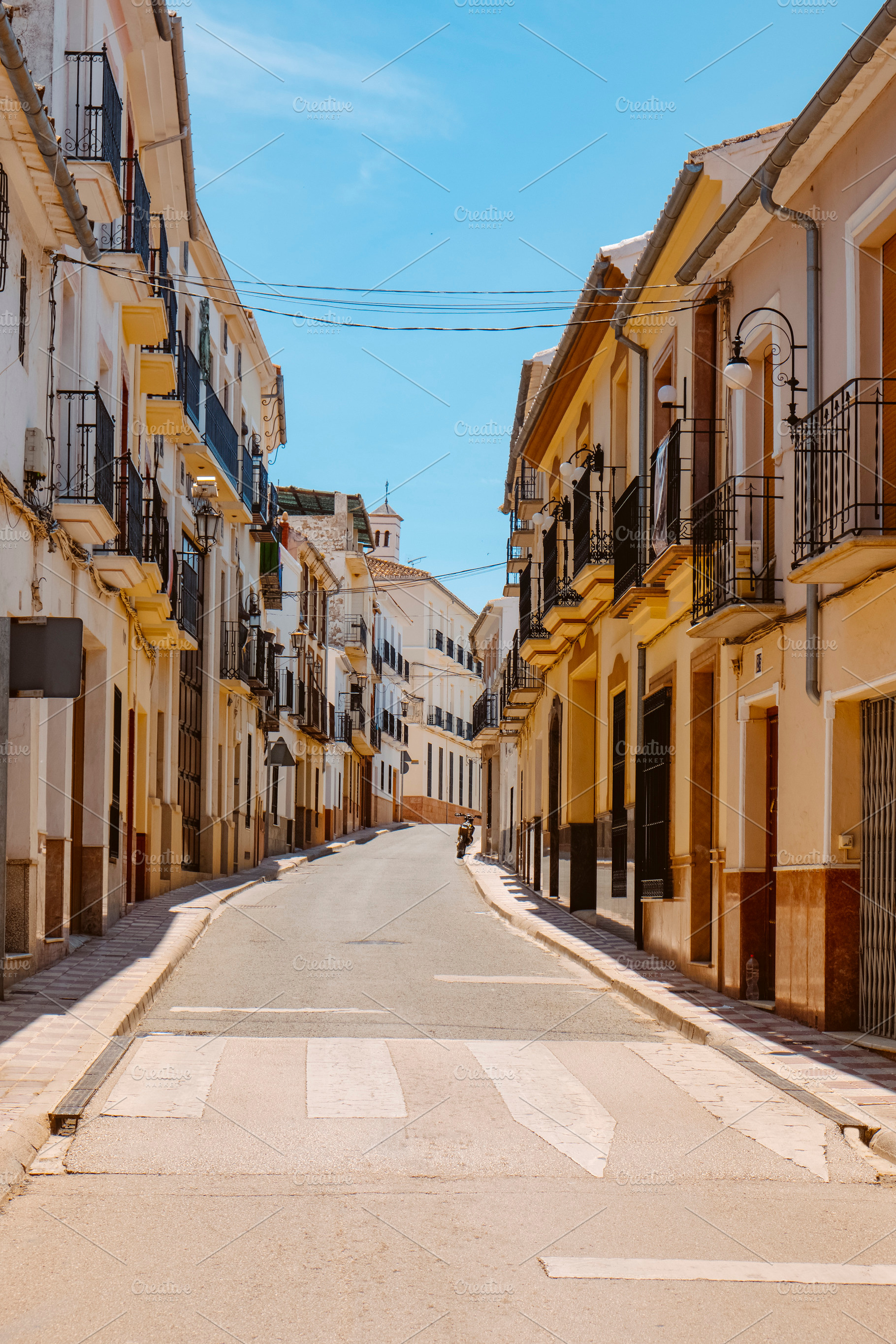 quiet street in Archidona, Spain, on spring, a Photo by Nito