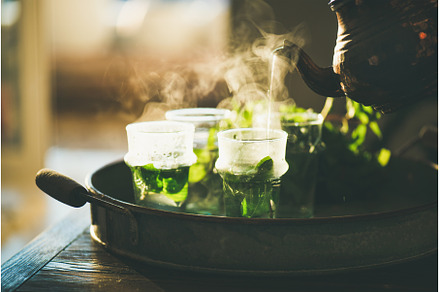 Fresh mint Moroccan tea in glasses, a Food & Drink Photo by Foxys