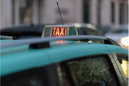 A bright sign of a waiting taxi car, a Transportation Photo by Barcelona_dreams