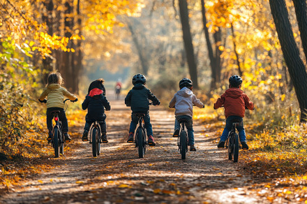 Families enjoy cycling, hiking, a Photo by Pavel_design