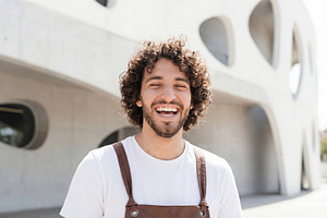 Modern Cheerful Male Artisan, a Business Photo by Virgo Studio