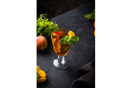 Cold ice tea with peach and mint, a Food & Drink Photo by Yulia Furman
