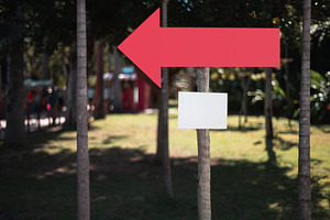 Blank arrow mockup sign outdoors, a Business Photo by SkyNext