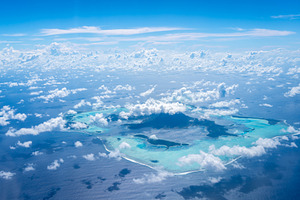 Aerial view of Bora Bora island and its turquoise lagoon, a Nature Photo by GoodGoods